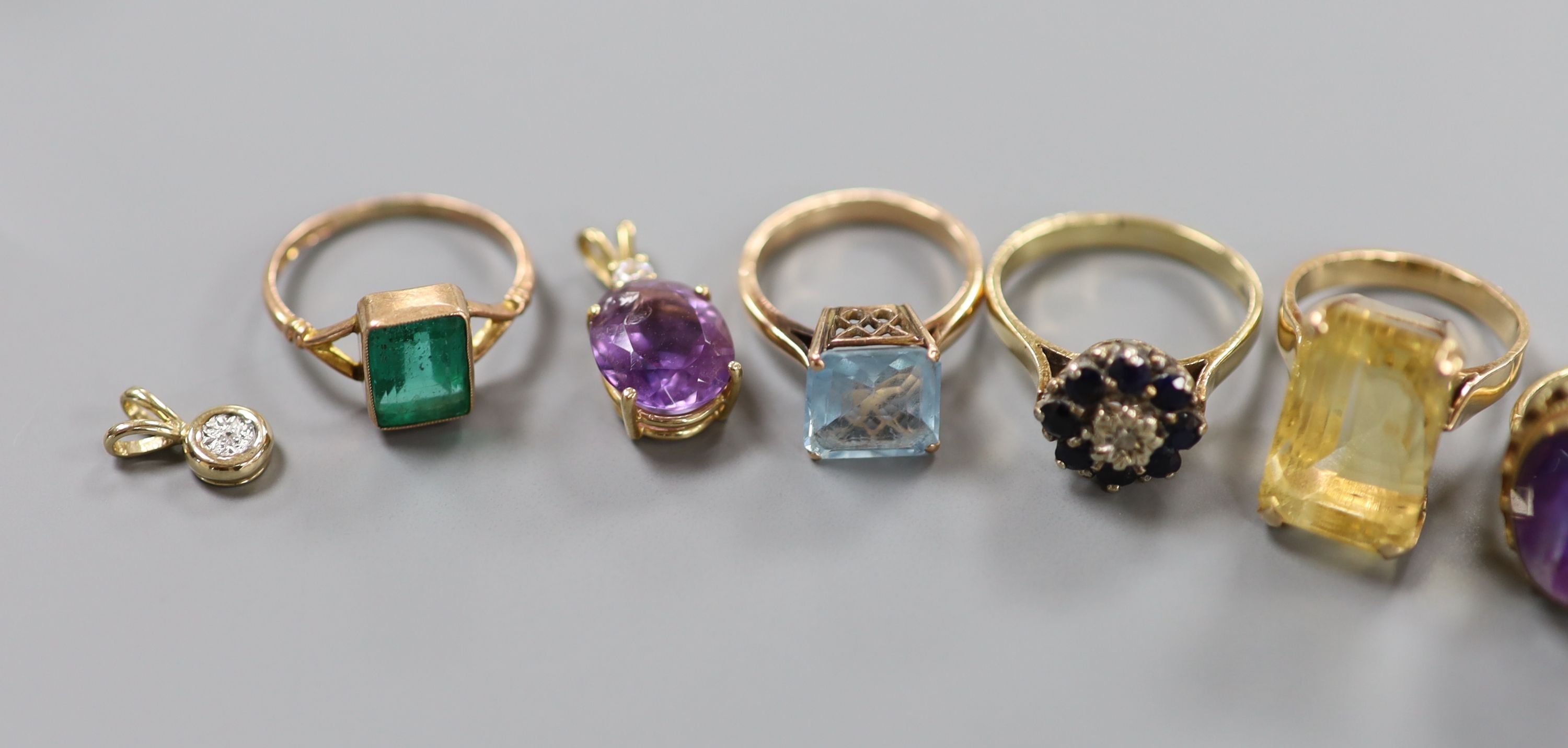 Mixed jewellery including five 9ct and gem set dress rings and a 9ct small pendant, gross 14.9 grams, an 18k and citrine ring and two 18k and amethyst set small pendants, gross 10 grams, a 15ct and amethyst brooch, gross